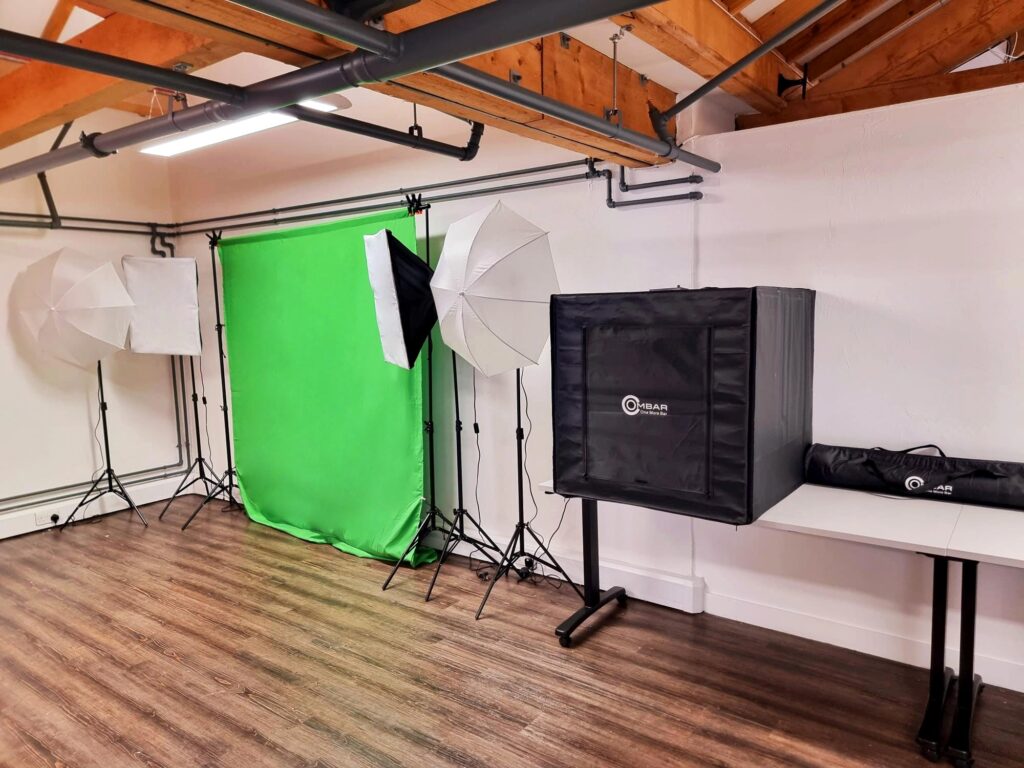 Photography creative facilities with green screen, studio lights and lightbox.